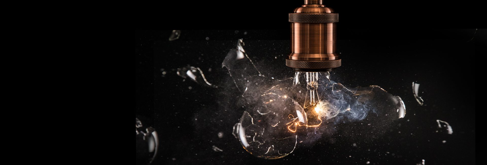 real explosion of vintage electric bulb, close-up.
